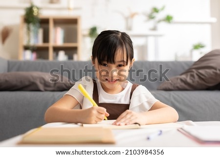 Similar – Image, Stock Photo Cute girl drawing on paper at home