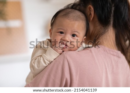 Thumbs or fingers sucking in baby newborn habit for calm and relax. Asian infant baby open mouth and putting fingers in to sucking feel secure.Baby newborn habit concept Stockfoto © 