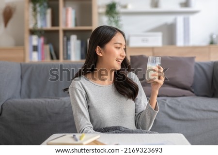 Similar – Foto Bild Frau mit Glas Getränk auf Picknickmatte mit Blick auf Meer und Berge