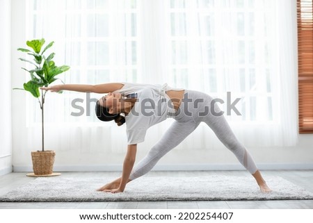 Similar – Image, Stock Photo Slim woman doing meditation on beach