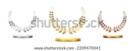 Golden, silver and bronze award signs with laurel wreath isolated on white background. Vector award design templates.