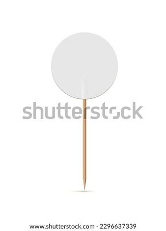 Toothpick with round golden blank flag, cake topper mockup vector illustration. Realistic 3D small gold decor label with circle frame and mini ribbed edges, luxury decoration tag on wooden stick