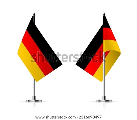Flags of Germany on pole vector illustration. 3D realistic flagpoles on mini steel vertical stands, isolated desktop flagstaff, black, red and yellow german flags with stripes on metal sticks.