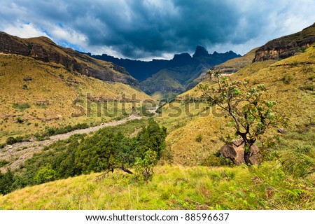 Mountain landscape  with thunder clouds in the backgroud