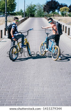 Similar – Foto Bild Anonymes Kind fährt Fahrrad auf dem Weg