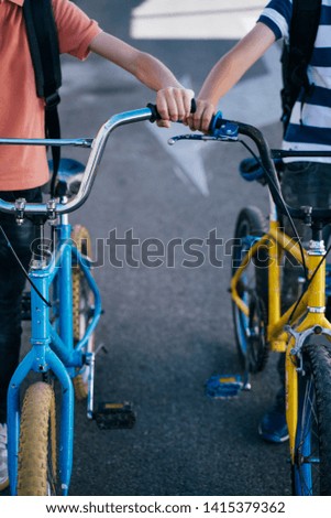 Similar – Foto Bild Anonymes Kind fährt Fahrrad auf dem Weg