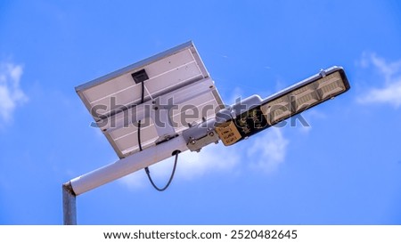 Similar – Foto Bild Straßenlampe und blauer Himmel auf der Straße