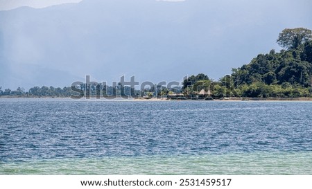 Similar – Foto Bild Erstaunlich üppige Halbinsel im blauen Meer