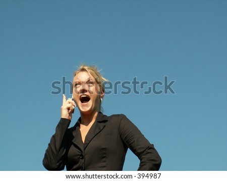 blonde business woman excited at news she is getting