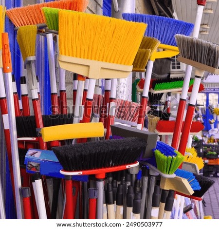 Similar – Image, Stock Photo Broom with red bristles and sweeper with straw bristles, stand after work done, tidy in the garage, summer house, broom closet.