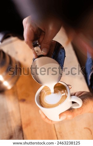 Similar – Image, Stock Photo Crop person pouring tea into bowl with herbs