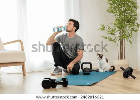 Similar – Image, Stock Photo Young man exercising in the park.