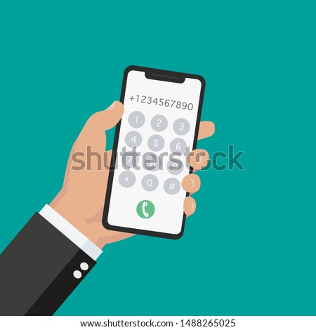 Dial number concept. Businessman holding the phone with buttons and numbers on the mobile phone screen to make a phone call