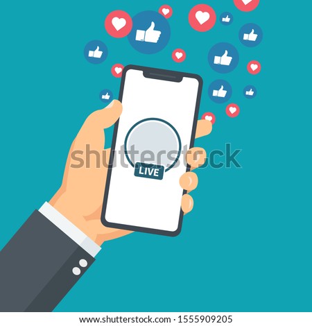 Social Media Marketing Solution - isolated on blue background. For web site,campaign,ui,ad and app. Hand holding phone with live icon and hearts and thumbs.