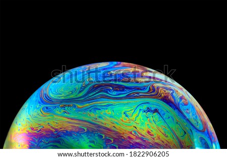 Image, Stock Photo The half soap bubble is reflected in the wet surface and in this way forms a whole again.