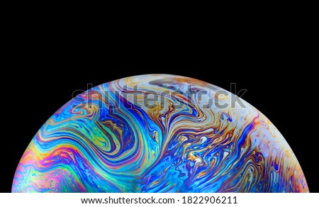 Similar – Image, Stock Photo The half soap bubble is reflected in the wet surface and in this way forms a whole again.