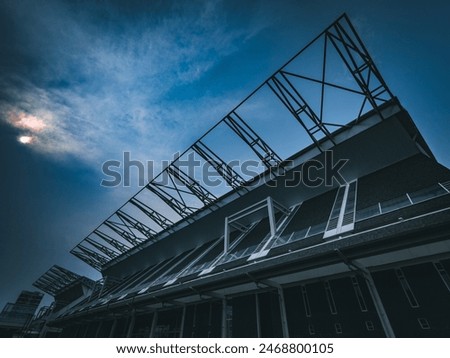 Similar – Foto Bild Verlassenes Gebäude gegen sauberen Himmel. Sowjetische modernistische Architektur, notleidende Betonhaus