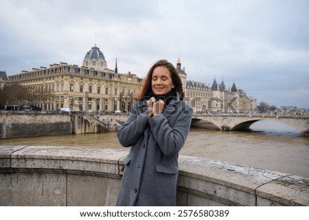 Similar – Image, Stock Photo thoughtful woman leaning on wall