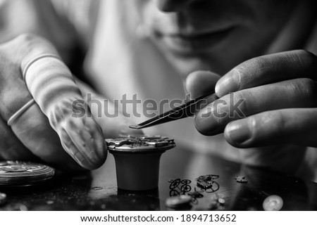 Similar – Image, Stock Photo Instrument maker working with hair for bow
