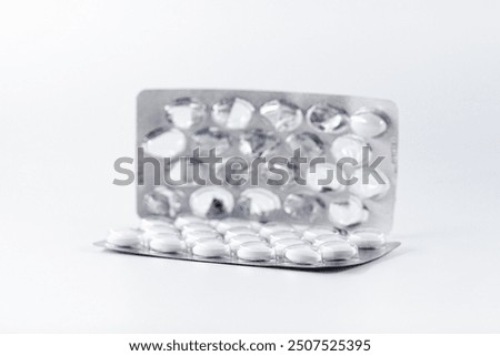 Similar – Image, Stock Photo Stacked tablets in blister pack