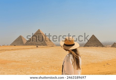 Similar – Image, Stock Photo vacation, heat, cairo egypt, heritage, historical, ancient civilization, pyramids egypt, camel, archaeology, pyramids of giza, destination, pyramids, focus, blue, sky, travel, tourists, bus, 2022, vibrant, orange, teal, giza, pyramid, cairo, egypt, grea…