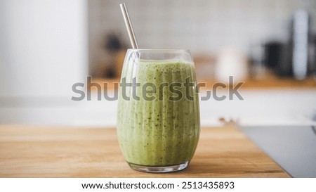 Similar – Foto Bild Gesunder grüner Smoothie im Glas auf schwarzem Stein