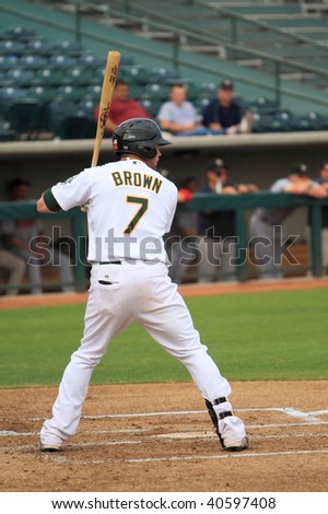 PHOENIX, AZ - NOVEMBER 4: Corey Brown, a rising star for the Oakland A\'s, bats in an Arizona Fall League game Nov. 4, 2009 in Phoenix, Arizona. Brown\'s Desert Dogs lost to the Saguaros, 3-2.