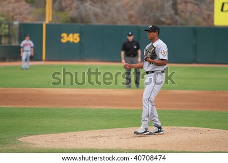 PHOENIX, AZ - NOVEMBER 4: Wilton Lopez, a rising star for the Houston Astros, pitches in an Arizona Fall League game Nov. 4, 2009 in Phoenix, Arizona. Lopez\' Saguaros beat the Desert Dogs, 3-2.