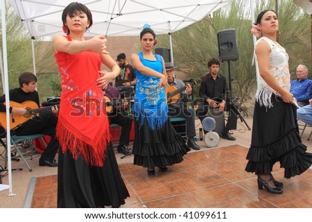 PHOENIX, AZ - NOVEMBER 14: The Mosaico Flamenco music and dance company performs at the Desert Botanical Garden Nov. 4, 2009 in Phoenix, Arizona.