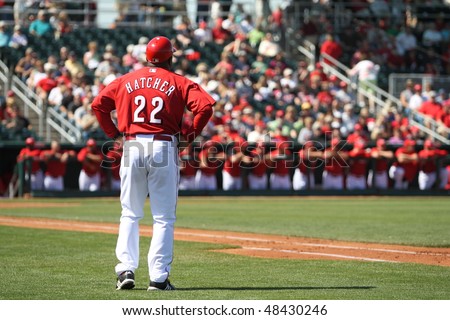 GOODYEAR, AZ - MARCH 5: Former Major Leaguer Billy Hatcher coaches first base in the Cincinnati Reds' inaugural Cactus League game March 5, 2010 at Goodyear Ballpark in Goodyear, Arizona.