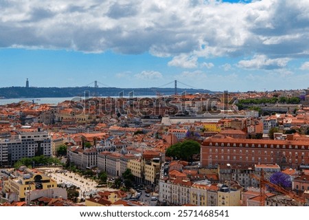 Similar – Foto Bild Die berühmte Brücke Ponte 25 de Abril in Lissabon, Portugal, im Hintergrund einer ruhigen Straße