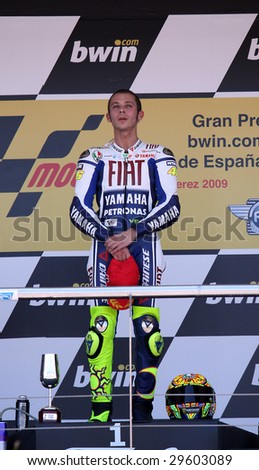 JEREZ - MAY 3 : Italian MotoGP rider Valentino Rossi sings the Italian national anthem during the prize giving ceremony of the GP betandwin.com of Spain, May 3, 2009 in Jerez de la Frontera, Spain.