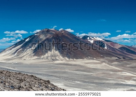 Similar – Image, Stock Photo Man standing in volcanic valley during trip