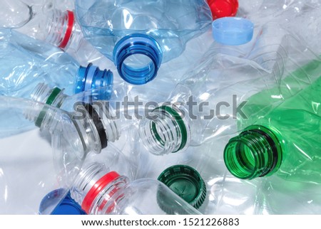 Similar – Image, Stock Photo Heap of plastic bottles, cups, bags collected to recycling