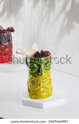 Similar – Image, Stock Photo Tiki glass of tropical cocktail with ice