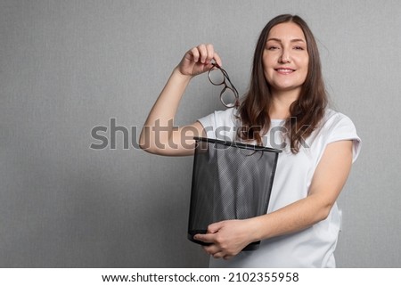 Similar – Foto Bild Junge Frau wirft leere gebrauchte Plastik-Wasserflaschen in den Mülleimer