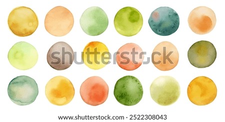 A series of watercolor circles in various shades of green, yellow, and brown. The circles are arranged in a grid pattern, with some overlapping and others standing alone. Scene is one of creativity