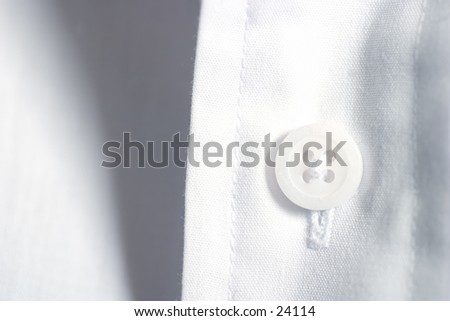 Button on linen shirt.