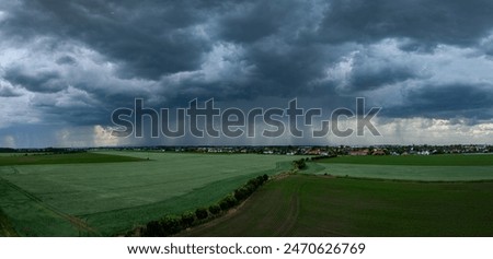 Similar – Foto Bild dunkle Gewitterwolke am Sommertag