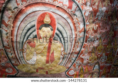 DAMBULLA, SRI LANKA - APR 17: Buddha painting in Cave temple on Apr 17, 2013 in Dambulla, Sri Lanka. This complex is  a World Heritage site and dates back to the 1st century BC.
