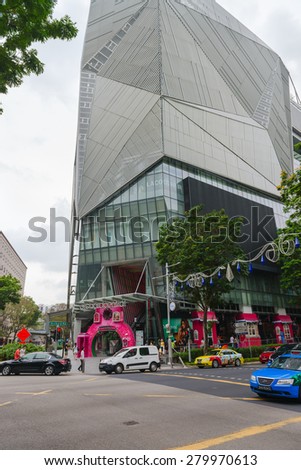 SINGAPORE - 01 JAN 2014: The bold, ultra-modern architecture of Orchard Central, one of the many shopping destinations along Orchard Road in downtown Singapore.
