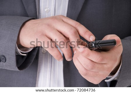Cell mobile Phone in business man hands