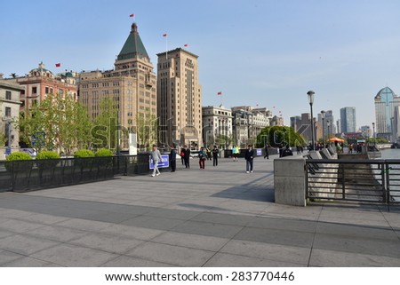 SHANGHAI - APRIL 15: Tourists come to visit the bund on April 11st, 2015 in Shanghai. The bund is the western bank of the Hangpu river facing pudong district.