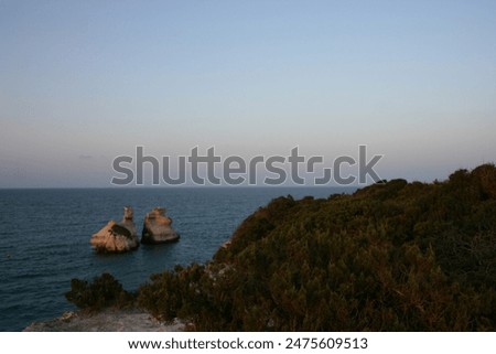 Image, Stock Photo The Two Sisters stacks in front of the shore of Torre dell’Orso