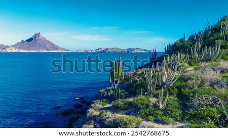 Image, Stock Photo Remote rocky seaside at bright sunset