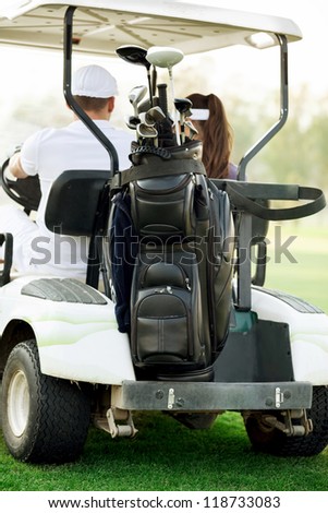 golf cart with golf beg