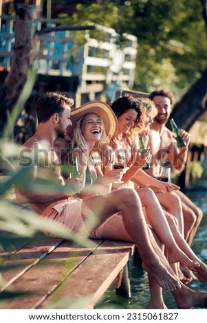 Similar – Image, Stock Photo Playful people in lake in summer