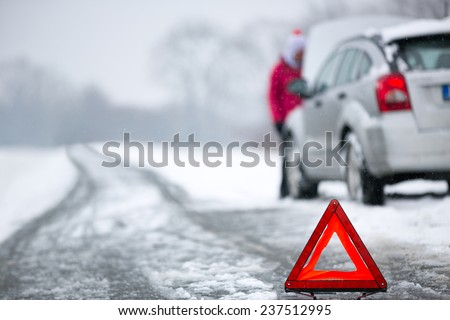 Similar – Image, Stock Photo Shoving snow on the roof. Remove snow from solar system