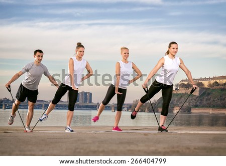 group exercise with resistance rubber, outdoor