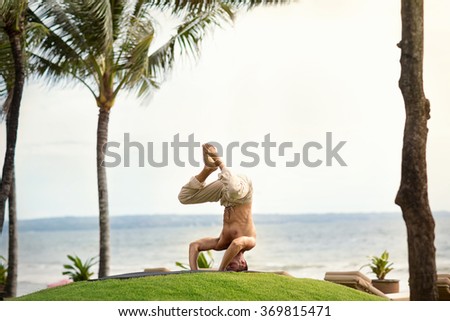 Similar – Image, Stock Photo Shirtless man doing yoga on terrace